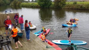YPF and families enjoying river activities